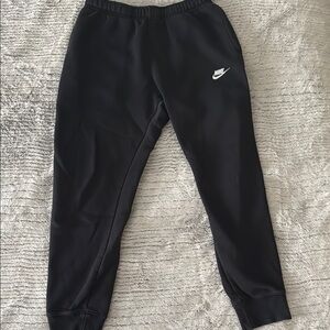 Nike Black Sweatpants with Elastic Cuffs and Relaxed Fit